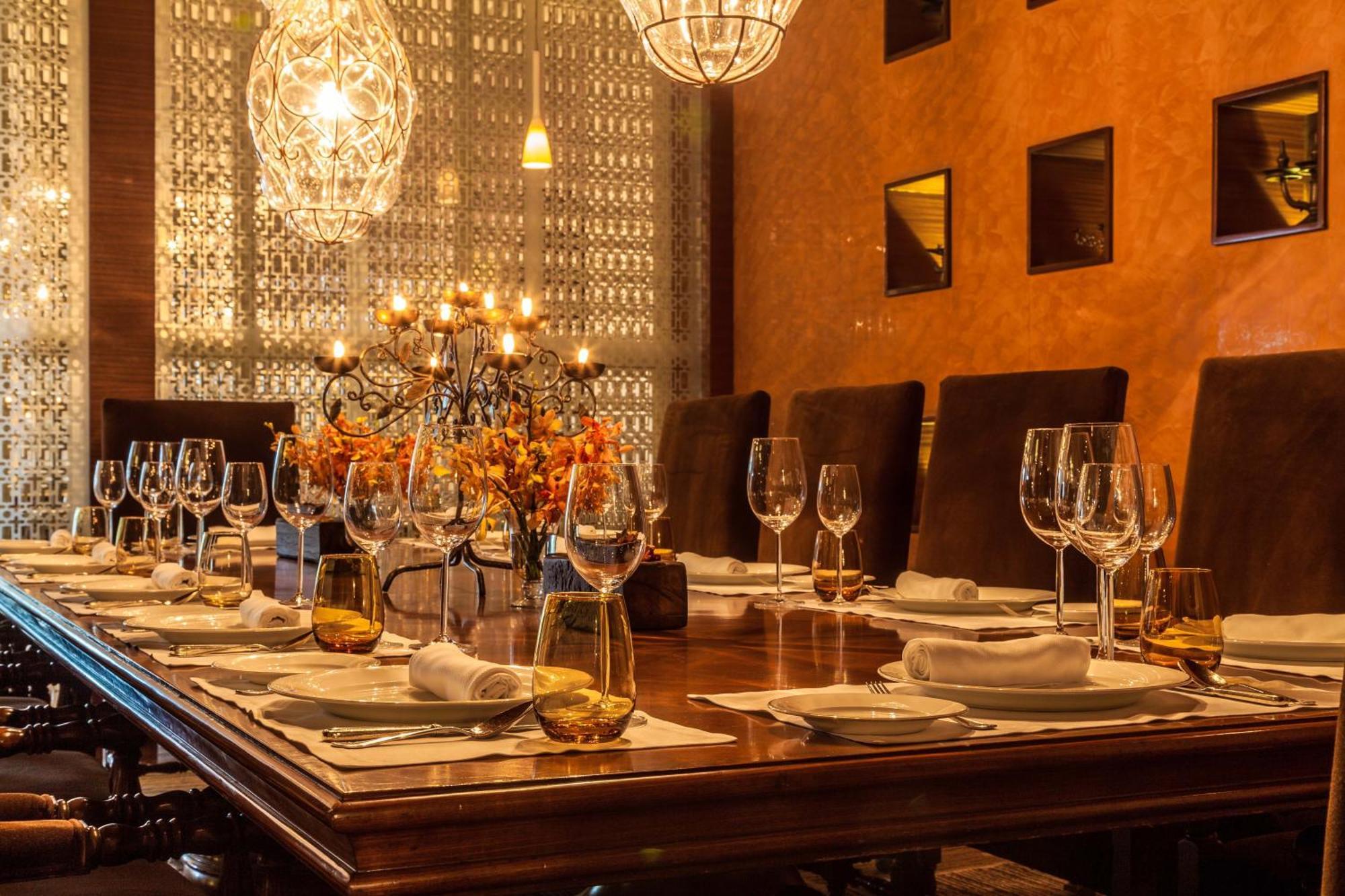 The Leela Ambience Gurugram Hotel & Residences - The Luxury Urban Sanctuary Gurgaon Zewnętrze zdjęcie A dining room table set for a meal